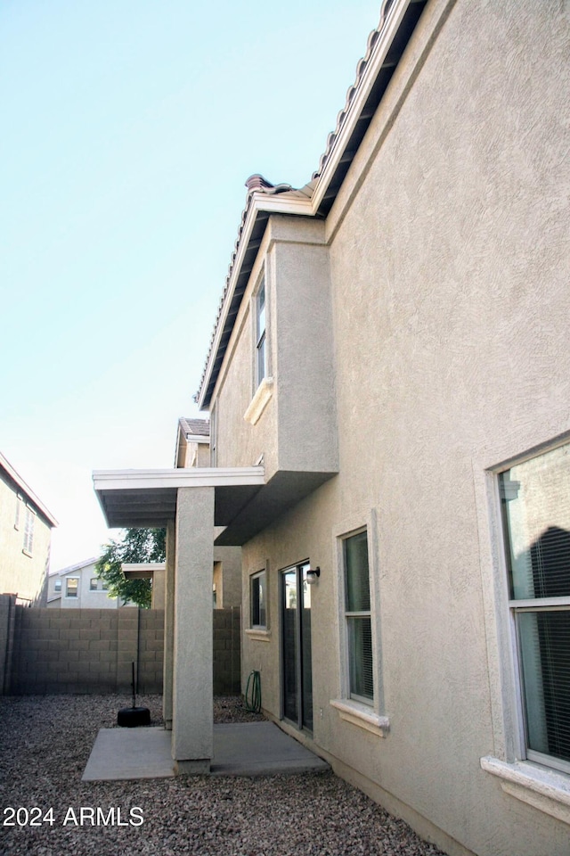 9527 N 82nd Ln, Peoria, AZ 85345 - rear view of house with a patio