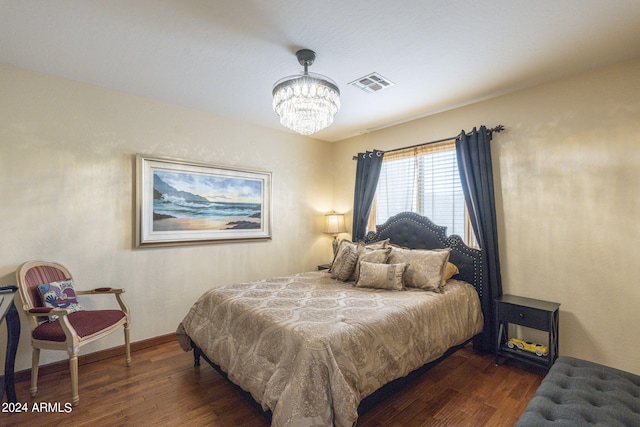 bedroom featuring dark wood-type flooring