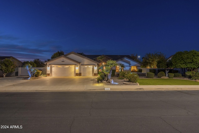 view of front of home with a garage