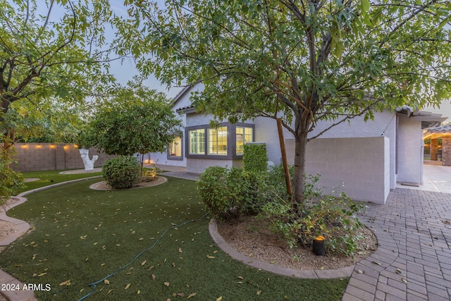 view of property exterior featuring a yard