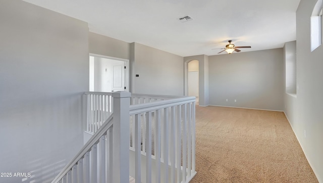 hall featuring carpet floors