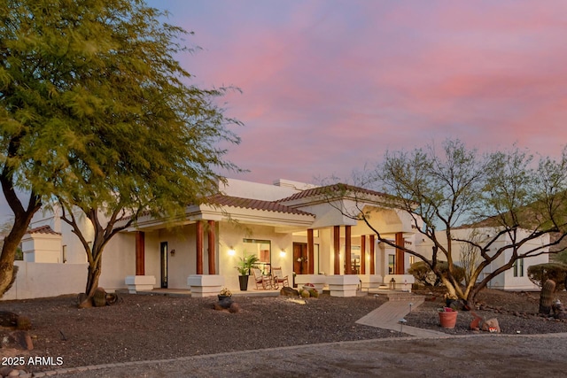 view of front of property with a patio