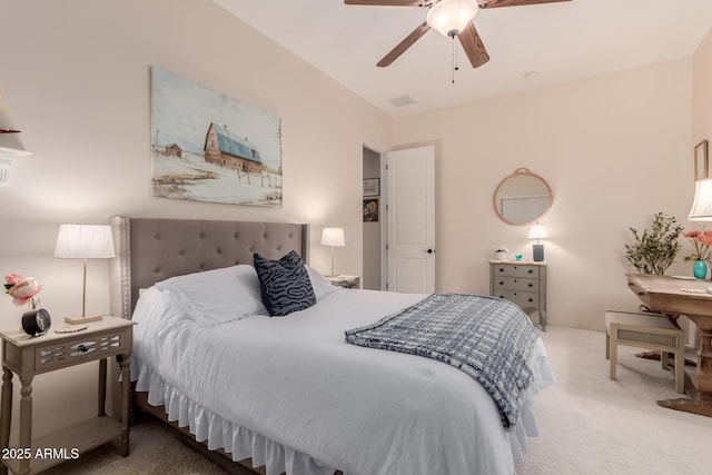 bedroom with ceiling fan and carpet