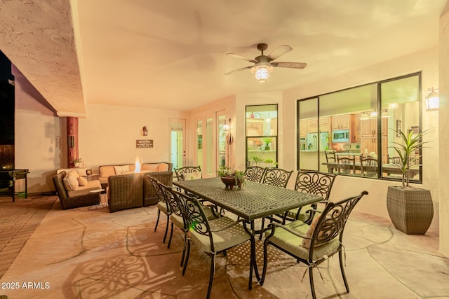 dining area with ceiling fan