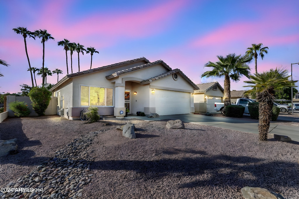 view of front of property with a garage