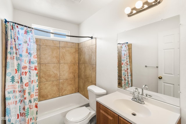 full bathroom featuring shower / bath combo with shower curtain, vanity, and toilet