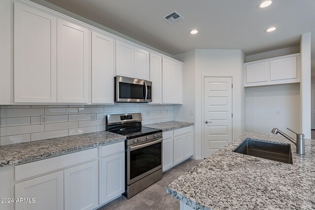 bathroom with vanity and walk in shower