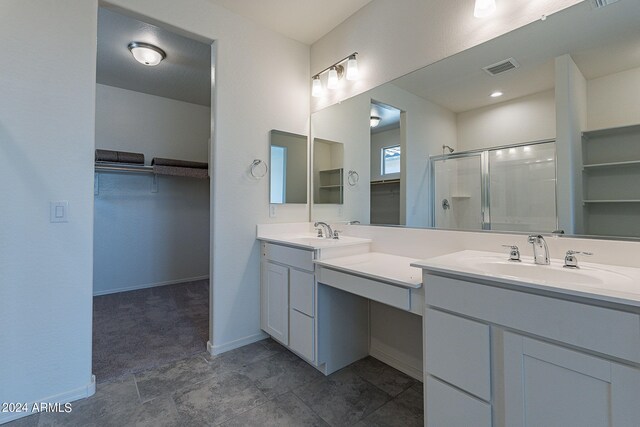 bathroom featuring a shower with shower door