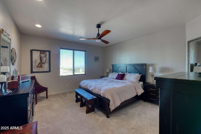 bedroom featuring recessed lighting, light carpet, ceiling fan, and baseboards