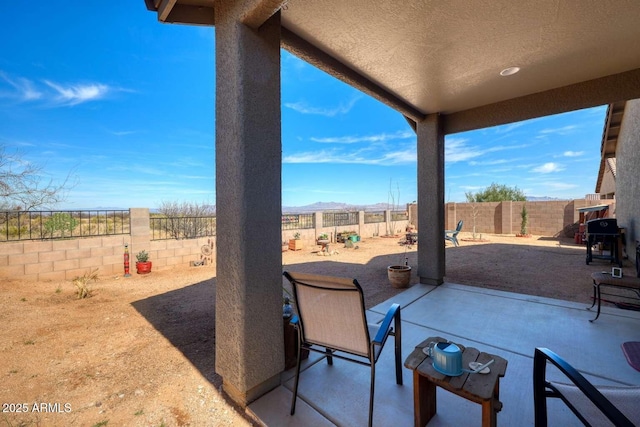 view of patio featuring a fenced backyard