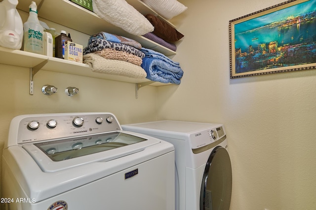 laundry area with washer and clothes dryer