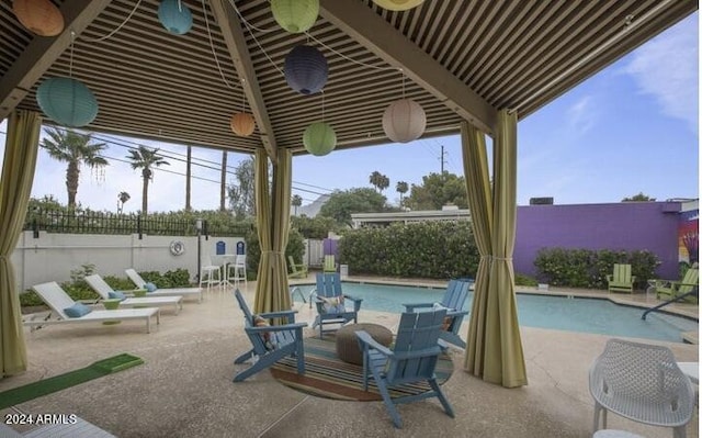 view of patio / terrace featuring a community pool