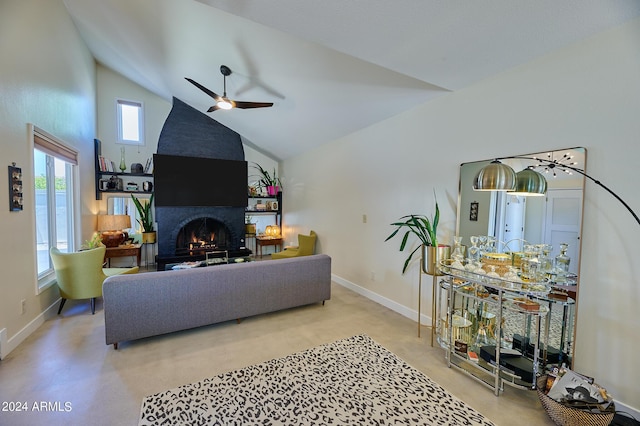 living room with ceiling fan, a large fireplace, and high vaulted ceiling