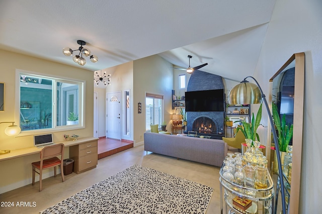 living room featuring an inviting chandelier, vaulted ceiling, built in desk, and a fireplace