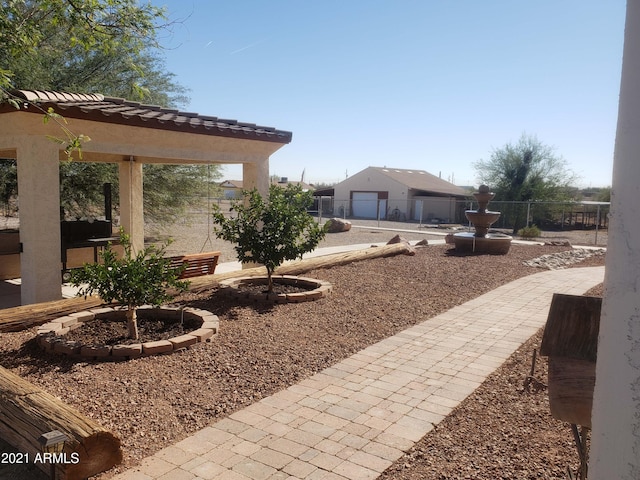 view of yard with a patio area and fence