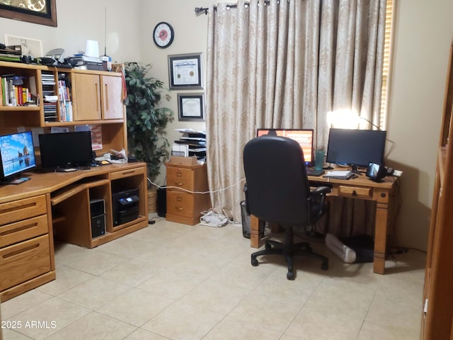 office space with light tile patterned floors