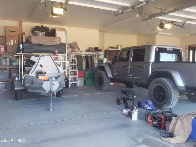 garage featuring a garage door opener