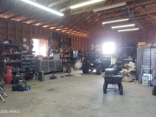 garage featuring a workshop area