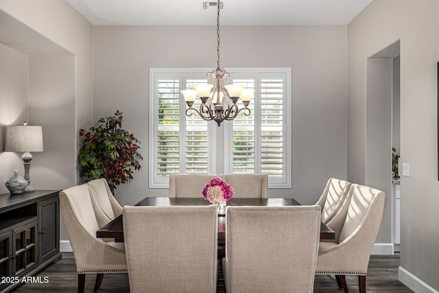20866 W Werner Pl, Buckeye, AZ 85396 - dining space with a chandelier, dark wood-style floors, and baseboards
