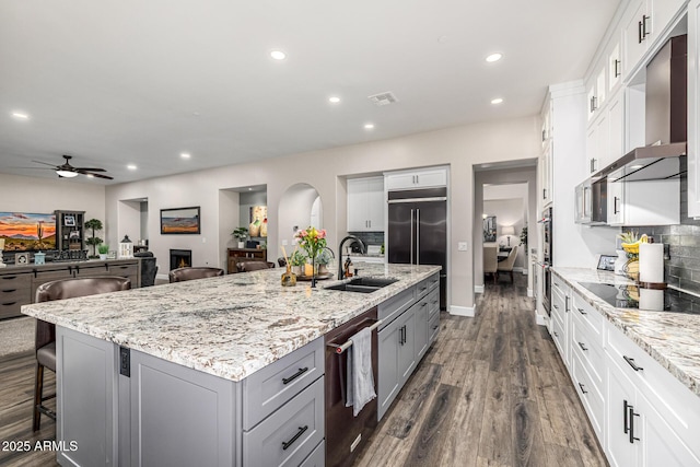 20866 W Werner Pl, Buckeye, AZ 85396 - kitchen featuring a sink, gray cabinetry, dark wood finished floors, a ceiling fan, and appliances with stainless steel finishes
