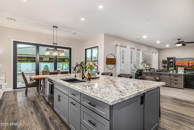 20866 W Werner Pl, Buckeye, AZ 85396 - kitchen featuring gray cabinetry, a sink, dark wood-style floors, recessed lighting, and a ceiling fan