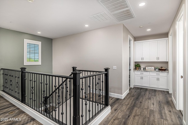 20866 W Werner Pl, Buckeye, AZ 85396 - hall with an upstairs landing, dark wood-style floors, recessed lighting, and baseboards