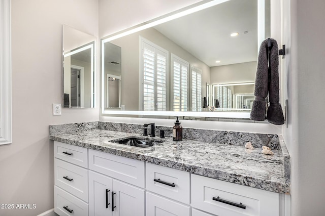 20866 W Werner Pl, Buckeye, AZ 85396 - bathroom featuring vanity and recessed lighting
