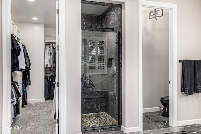 20866 W Werner Pl, Buckeye, AZ 85396 - bathroom with a shower stall, baseboards, toilet, recessed lighting, and a walk in closet