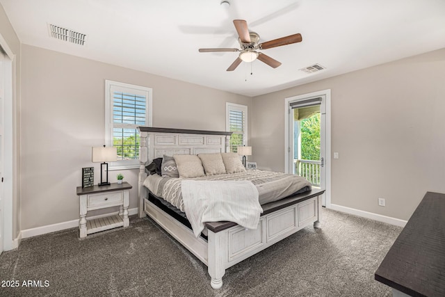20866 W Werner Pl, Buckeye, AZ 85396 - bedroom with access to exterior, dark carpet, baseboards, and ceiling fan