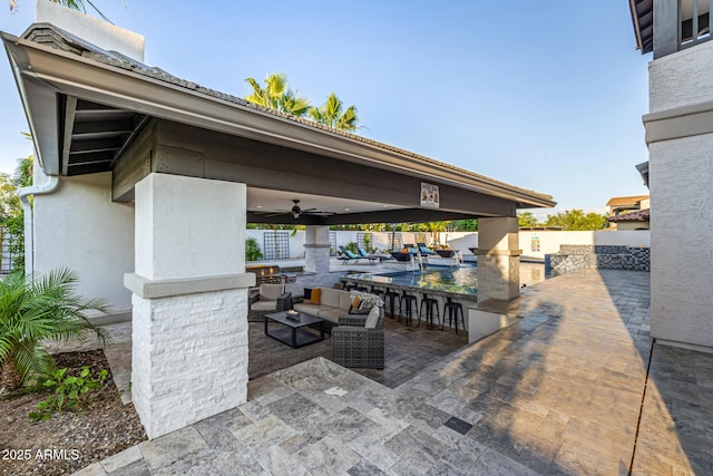 20866 W Werner Pl, Buckeye, AZ 85396 - view of patio / terrace with a ceiling fan and an outdoor hangout area