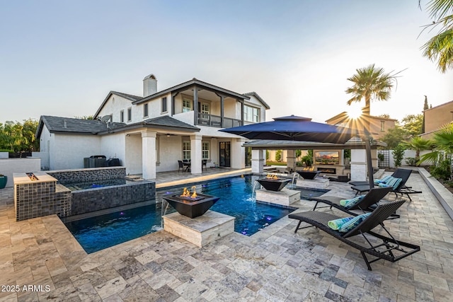 20866 W Werner Pl, Buckeye, AZ 85396 - rear view of property with a balcony, a gazebo, exterior kitchen, and a patio