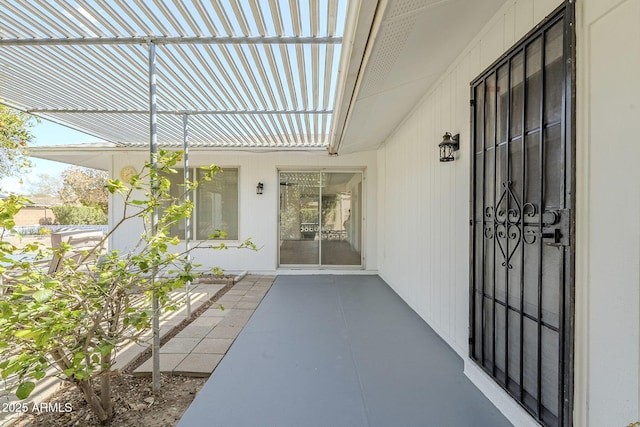 doorway to property with a patio area