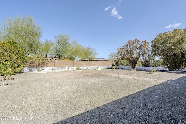 view of yard featuring fence