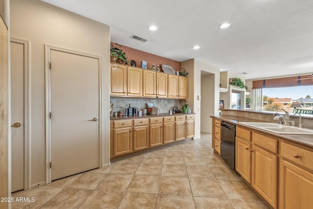 kitchen featuring tasteful backsplash, sink, black dishwasher, and light brown cabinets