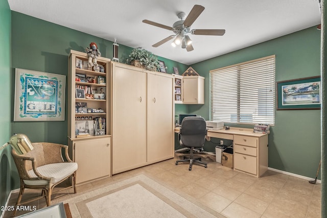 office area with ceiling fan