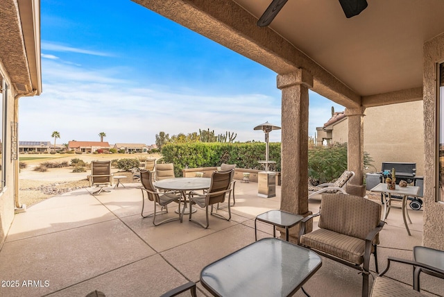 view of patio / terrace featuring ceiling fan