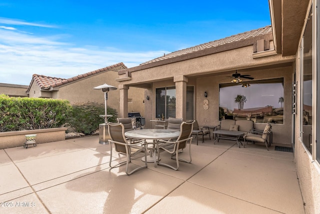 view of patio / terrace with ceiling fan