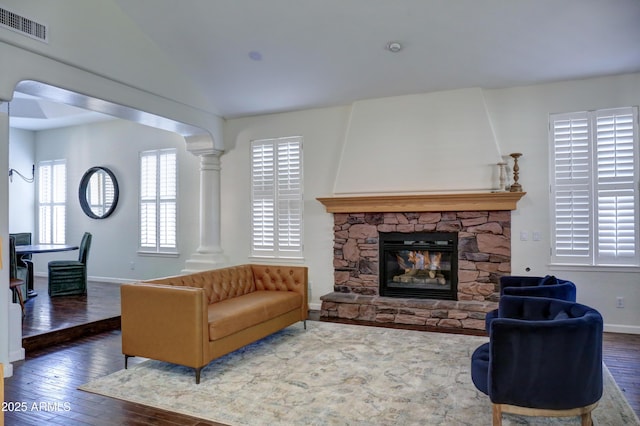 1707 E Carob Dr, Chandler, AZ 85286 - living area with wood-type flooring, decorative columns, baseboards, and vaulted ceiling
