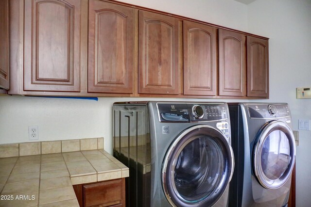 1707 E Carob Dr, Chandler, AZ 85286 - laundry area with washer and dryer and cabinet space