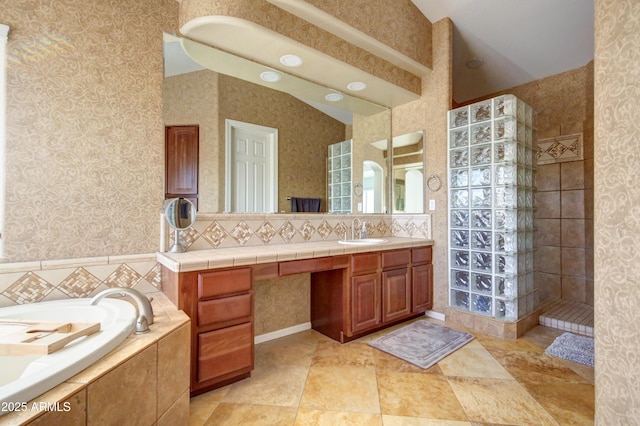 1707 E Carob Dr, Chandler, AZ 85286 - bathroom with walk in shower, a bath, vanity, and wallpapered walls