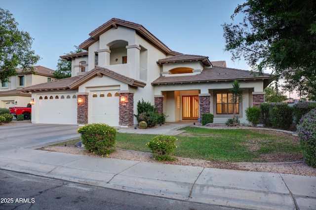 1707 E Carob Dr, Chandler, AZ 85286 - view of front of home with stone siding, stucco siding, concrete driveway, and a front yard