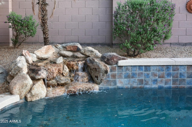 1707 E Carob Dr, Chandler, AZ 85286 - exterior view of fence and a pool