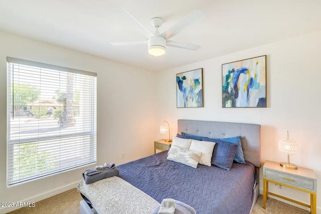 bedroom featuring carpet floors and ceiling fan