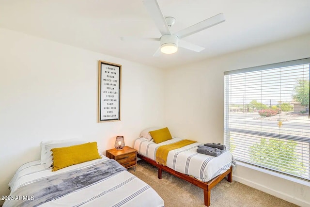 bedroom featuring carpet and ceiling fan