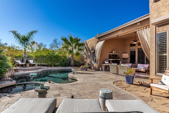 view of pool with an outdoor hangout area, ceiling fan, and a patio area