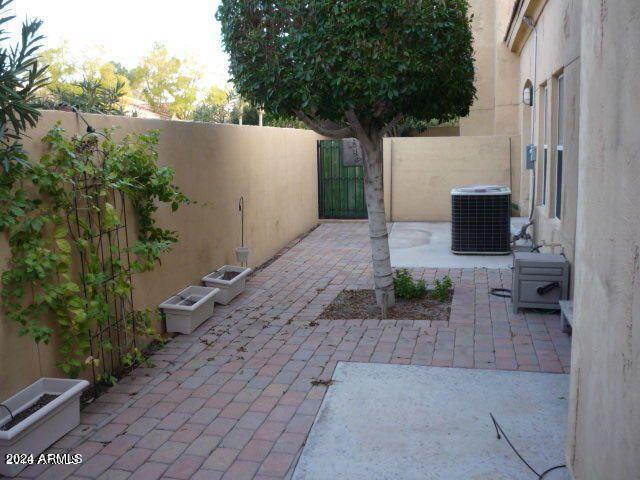 view of patio / terrace with cooling unit