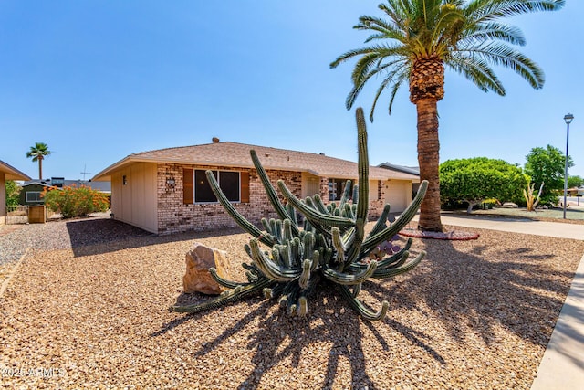 9603 W Calico Dr, Sun City, AZ 85373 - view of front of property featuring brick siding