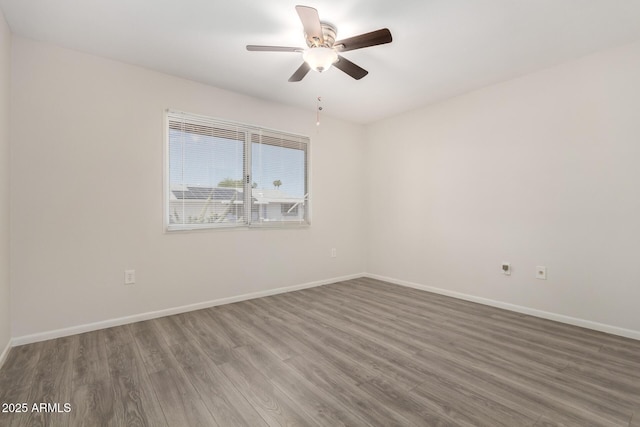 9603 W Calico Dr, Sun City, AZ 85373 - spare room with wood finished floors and ceiling fan