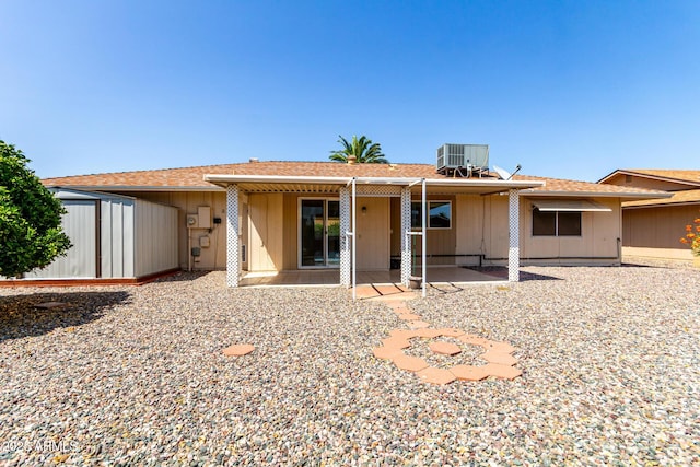 9603 W Calico Dr, Sun City, AZ 85373 - back of house with a storage shed and a patio area