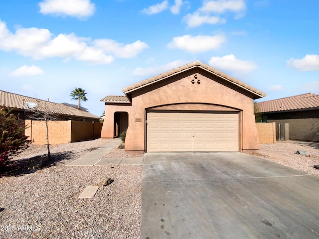 view of front of property with a garage